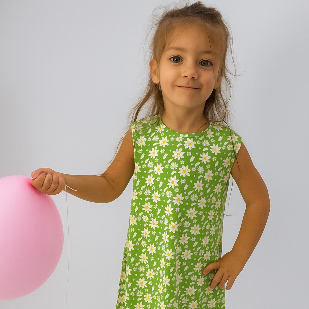 Ola! Otter Breezy Daisy print on an organic cotton A-line dress for girls